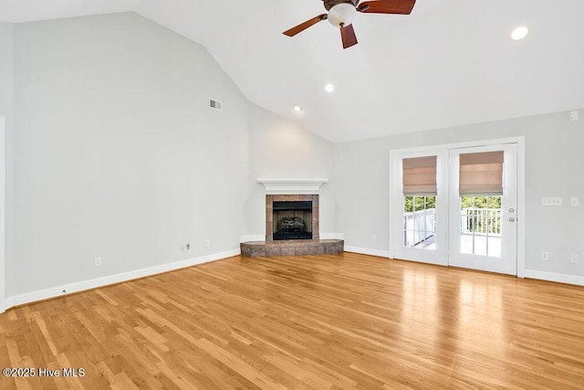 600 Sea Castle Ct, Wilmington, NC 28412 - unfurnished living room featuring light wood finished floors, a fireplace, baseboards, ceiling fan, and recessed lighting