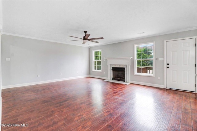 unfurnished living room featuring a ceiling fan, dark wood-style floors, and crown molding