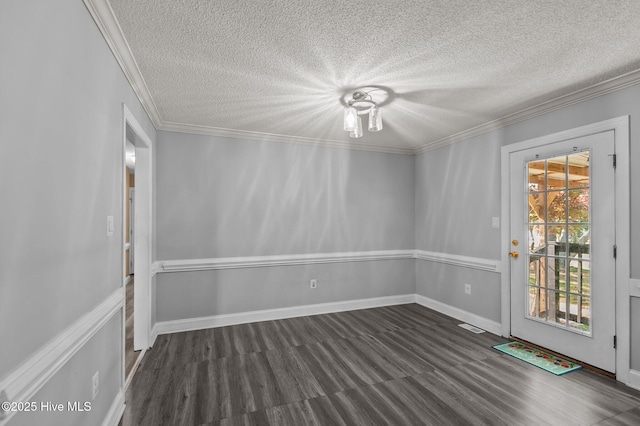 5065 Chris Rd, Bailey, NC 27807 - empty room featuring crown molding, a textured ceiling, and dark wood-type flooring