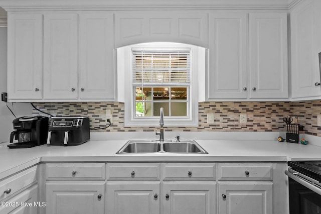 5065 Chris Rd, Bailey, NC 27807 - kitchen with a sink, white cabinets, and light countertops