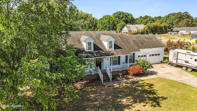 5065 Chris Rd, Bailey, NC 27807 - cape cod house with a porch, an attached garage, driveway, and crawl space