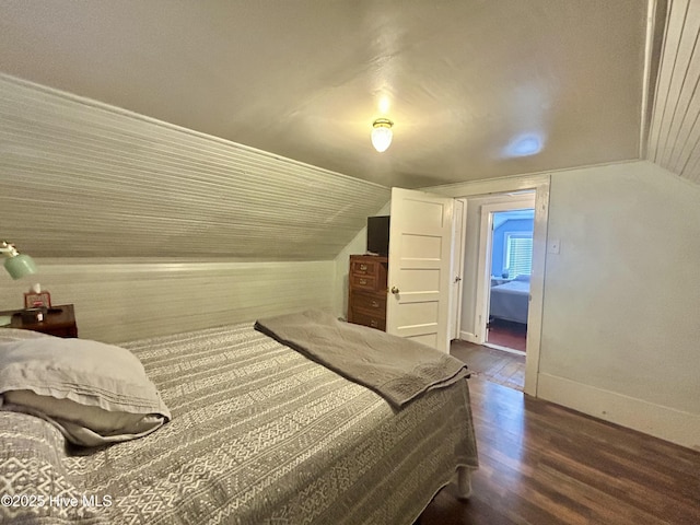 417 Turner St, Beaufort, NC 28516 - bedroom with wood finished floors, vaulted ceiling, and baseboards