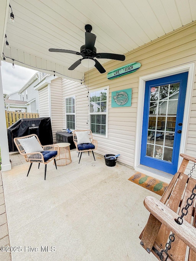 view of patio / terrace featuring ceiling fan