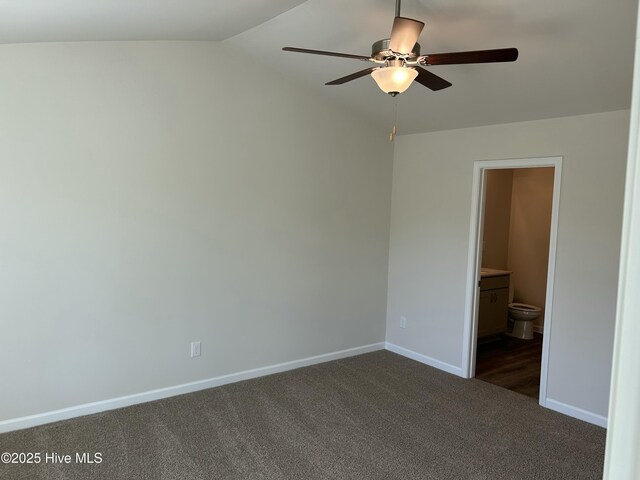 586 Chicod St, Grimesland, NC 27837 - unfurnished room featuring a ceiling fan, baseboards, vaulted ceiling, and dark carpet