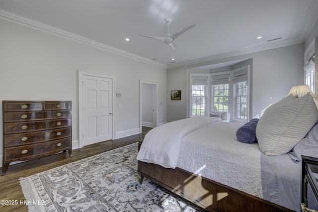 bedroom featuring crown molding, recessed lighting, and wood finished floors