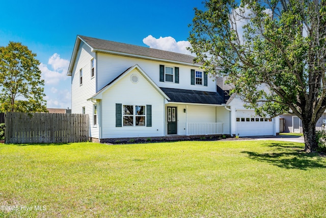 view of front of house with driveway, roof with shingles, a front yard, a garage, and fence