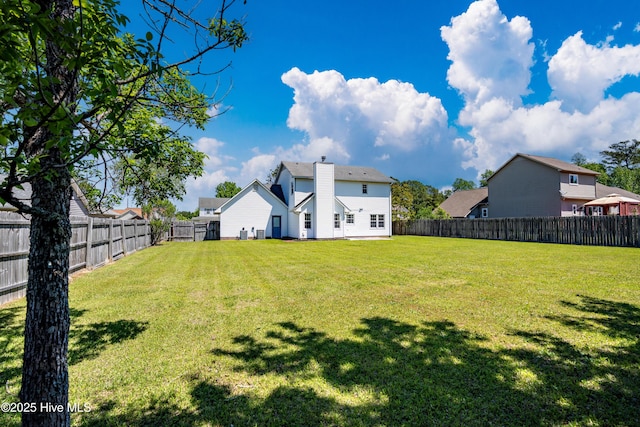 view of yard featuring a fenced backyard