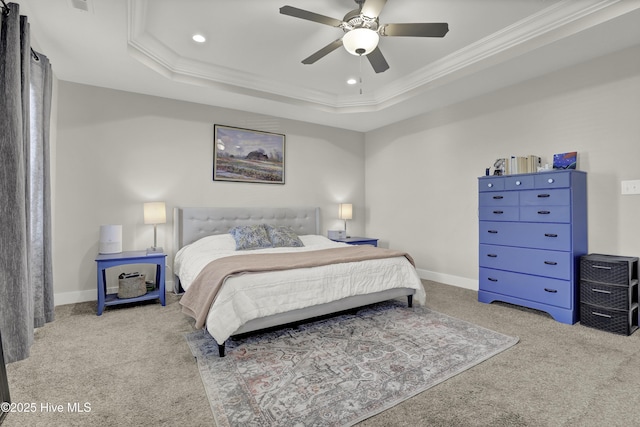 bedroom featuring recessed lighting, crown molding, carpet floors, a raised ceiling, and baseboards
