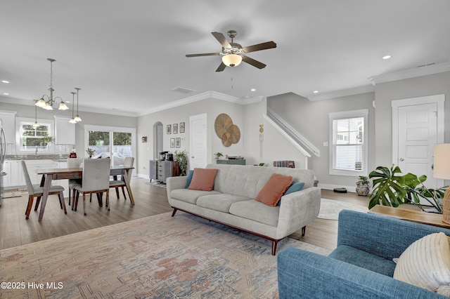 living area with ceiling fan, recessed lighting, and a wealth of natural light
