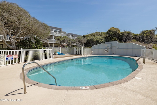 community pool with fence