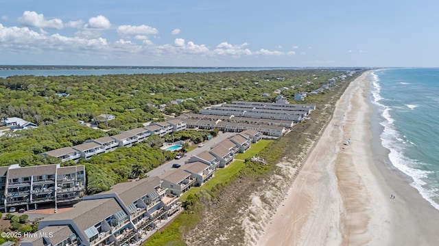 aerial view with a water view and a view of the beach