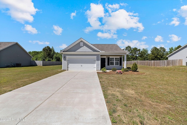 310 Settlers Pointe Dr, Pikeville, NC 27863 - view of front of home with driveway and a garage