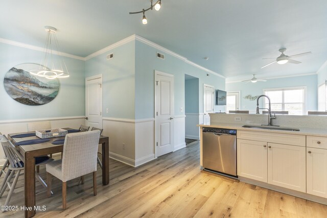 615 N New River Dr Unit E, Surf City, NC 28445 - kitchen with stainless steel dishwasher, visible vents, a sink, and light wood-style floors