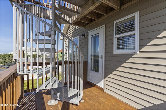 615 N New River Dr Unit E, Surf City, NC 28445 - view of wooden balcony featuring a deck and stairs