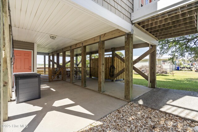 615 N New River Dr Unit E, Surf City, NC 28445 - view of patio / terrace with a carport