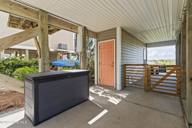 615 N New River Dr Unit E, Surf City, NC 28445 - view of patio with covered porch