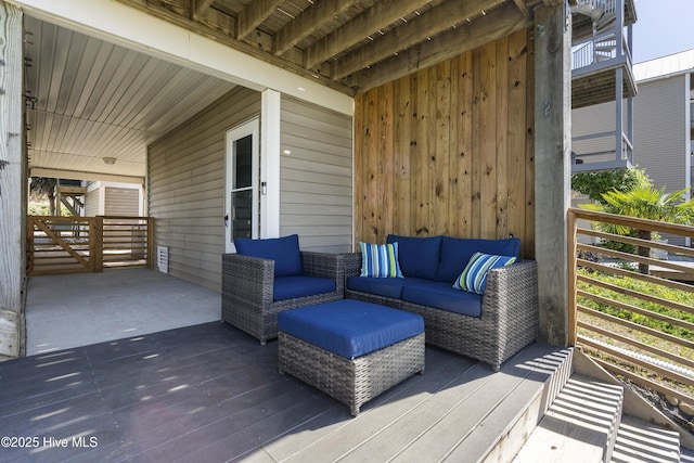 615 N New River Dr Unit E, Surf City, NC 28445 - wooden deck featuring outdoor lounge area