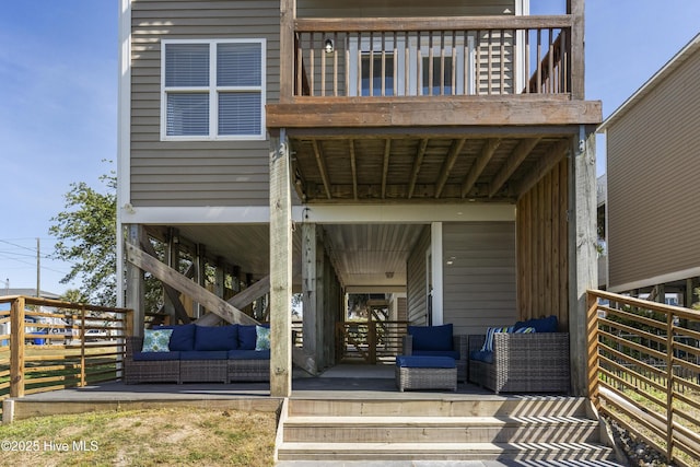 615 N New River Dr Unit E, Surf City, NC 28445 - back of property featuring outdoor lounge area and a balcony