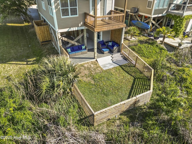 615 N New River Dr Unit E, Surf City, NC 28445 - view of yard featuring outdoor lounge area, a patio area, a deck, and a fenced backyard