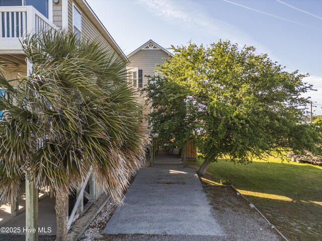 615 N New River Dr Unit E, Surf City, NC 28445 - exterior space featuring a yard