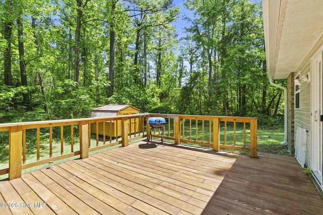 deck featuring an outdoor structure