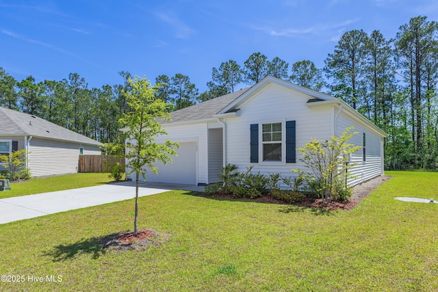 single story home featuring fence, an attached garage, driveway, and a front yard