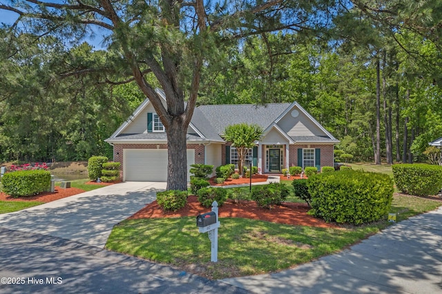 ranch-style home with concrete driveway and brick siding