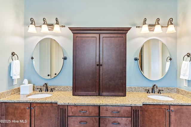 full bathroom featuring double vanity