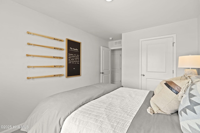 bedroom with visible vents