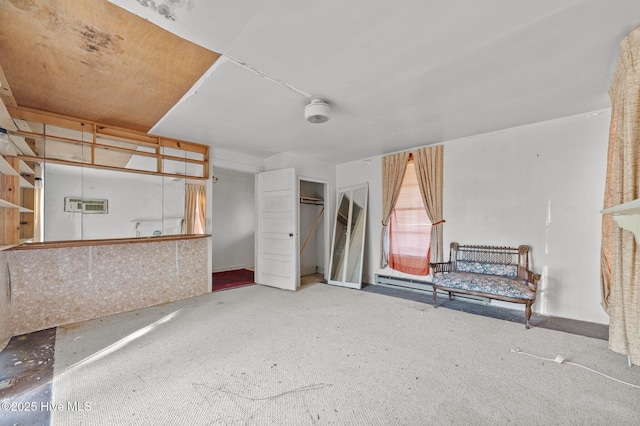 interior space with a wall mounted air conditioner