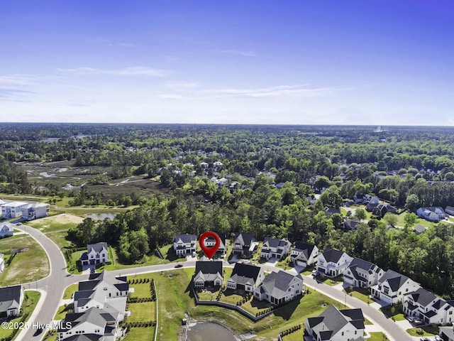 bird's eye view featuring a water view and a residential view