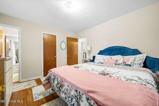 1109 Laurel Ave, Rockingham, NC 28379 - bedroom with hardwood / wood-style flooring and a closet