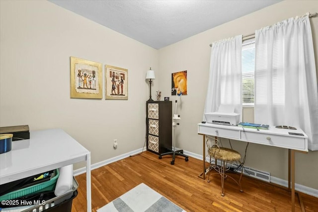 1109 Laurel Ave, Rockingham, NC 28379 - home office featuring wood finished floors and baseboards