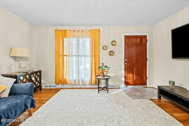 1109 Laurel Ave, Rockingham, NC 28379 - living room featuring wood finished floors and baseboards