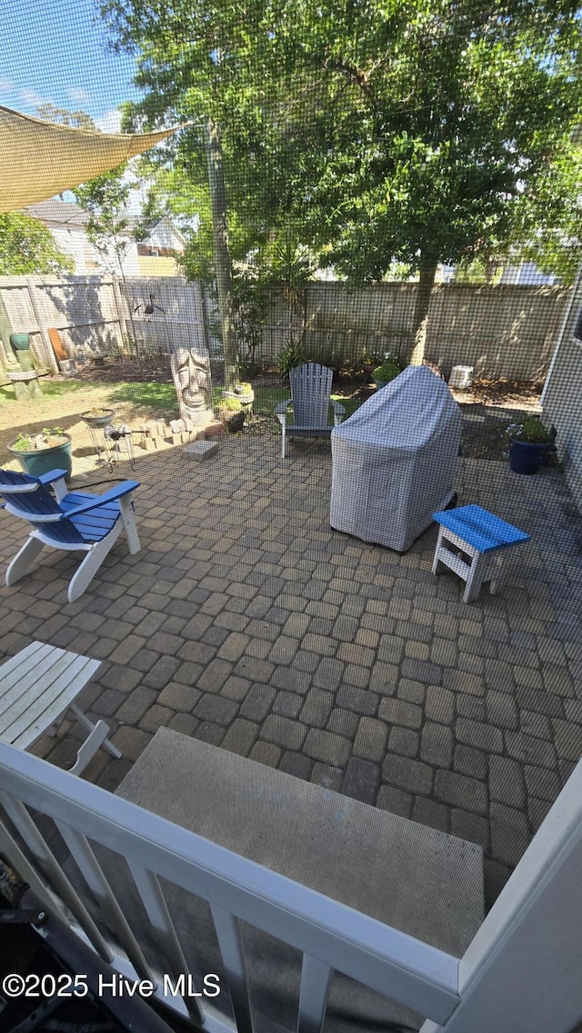 view of patio with a fenced backyard