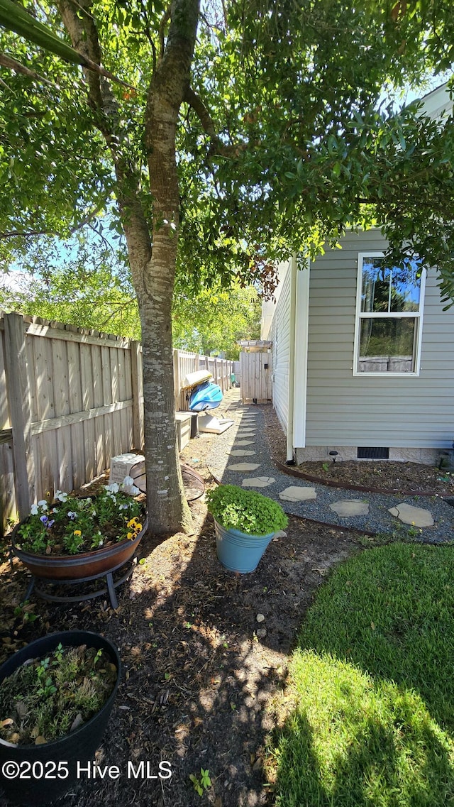 view of yard with fence