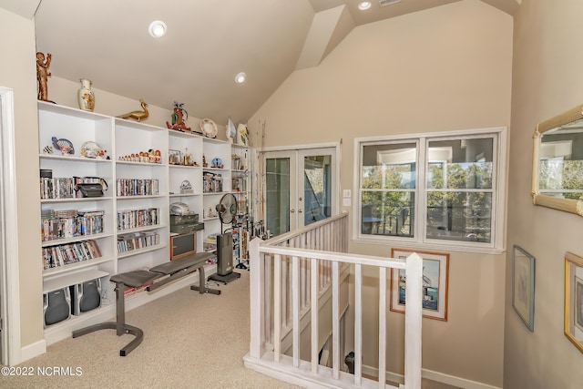 workout room featuring carpet floors, recessed lighting, french doors, and lofted ceiling