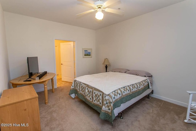 bedroom with light carpet, baseboards, and ceiling fan