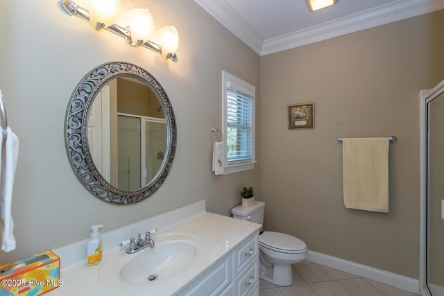 84 Deerwood Ln, Pinehurst, NC 28374 - bathroom with a shower stall, vanity, tile patterned floors, toilet, and ornamental molding
