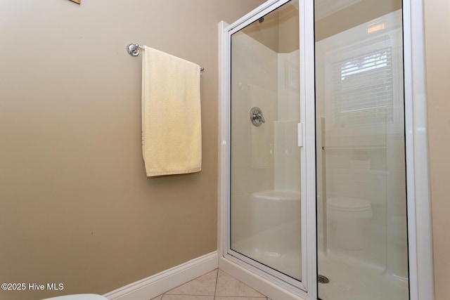 84 Deerwood Ln, Pinehurst, NC 28374 - full bathroom featuring baseboards, tile patterned floors, toilet, and a shower stall