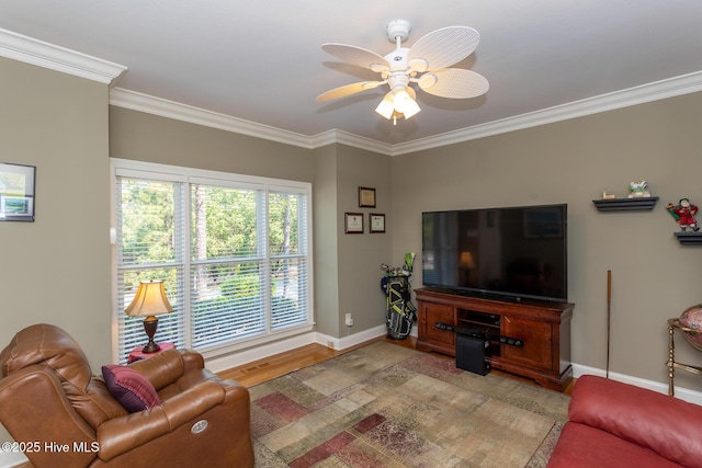 84 Deerwood Ln, Pinehurst, NC 28374 - living area featuring ceiling fan, ornamental molding, baseboards, and light wood-style flooring