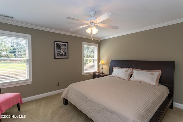 84 Deerwood Ln, Pinehurst, NC 28374 - carpeted bedroom featuring crown molding, baseboards, a ceiling fan, and visible vents