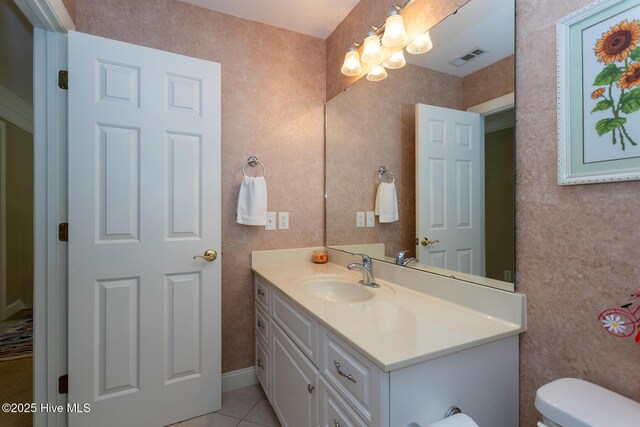 84 Deerwood Ln, Pinehurst, NC 28374 - bathroom featuring vanity, visible vents, an inviting chandelier, toilet, and tile patterned floors