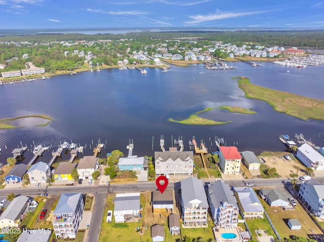birds eye view of property featuring a residential view and a water view
