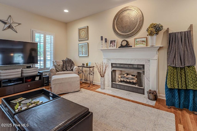 920 Diamondhead Dr S, Pinehurst, NC 28374 - living area with recessed lighting, baseboards, wood finished floors, and a premium fireplace