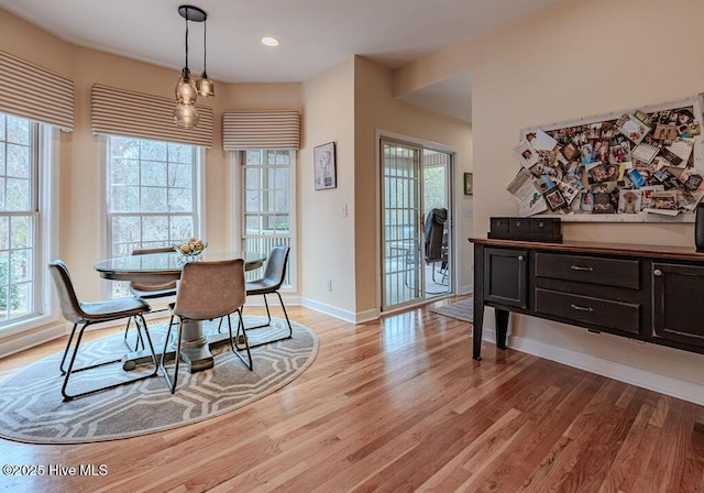 920 Diamondhead Dr S, Pinehurst, NC 28374 - dining area featuring baseboards, light wood-style flooring, and a wealth of natural light