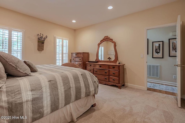 920 Diamondhead Dr S, Pinehurst, NC 28374 - bedroom with visible vents, recessed lighting, carpet floors, and multiple windows