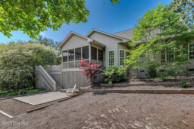 920 Diamondhead Dr S, Pinehurst, NC 28374 - exterior space with a sunroom and stairway