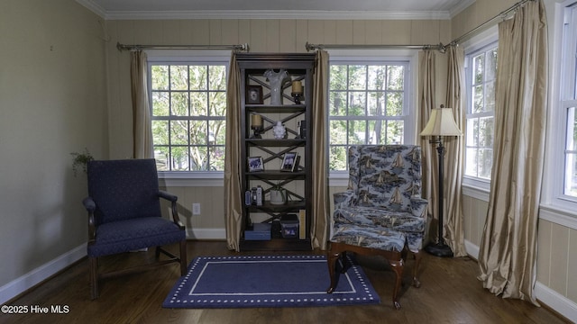 1914 Howard Ave, Tarboro, NC 27886 - living area with crown molding, wood finished floors, plenty of natural light, and baseboards