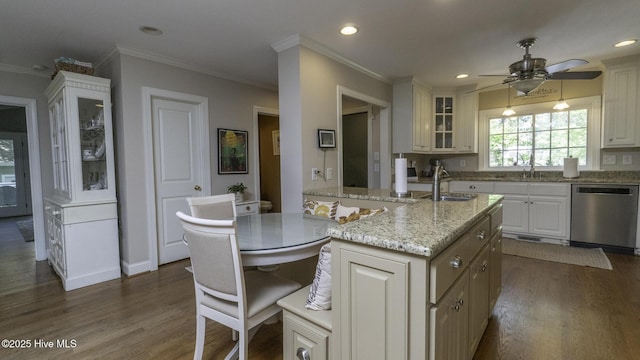 1914 Howard Ave, Tarboro, NC 27886 - kitchen featuring glass insert cabinets, a sink, stainless steel dishwasher, dark wood-type flooring, and ceiling fan